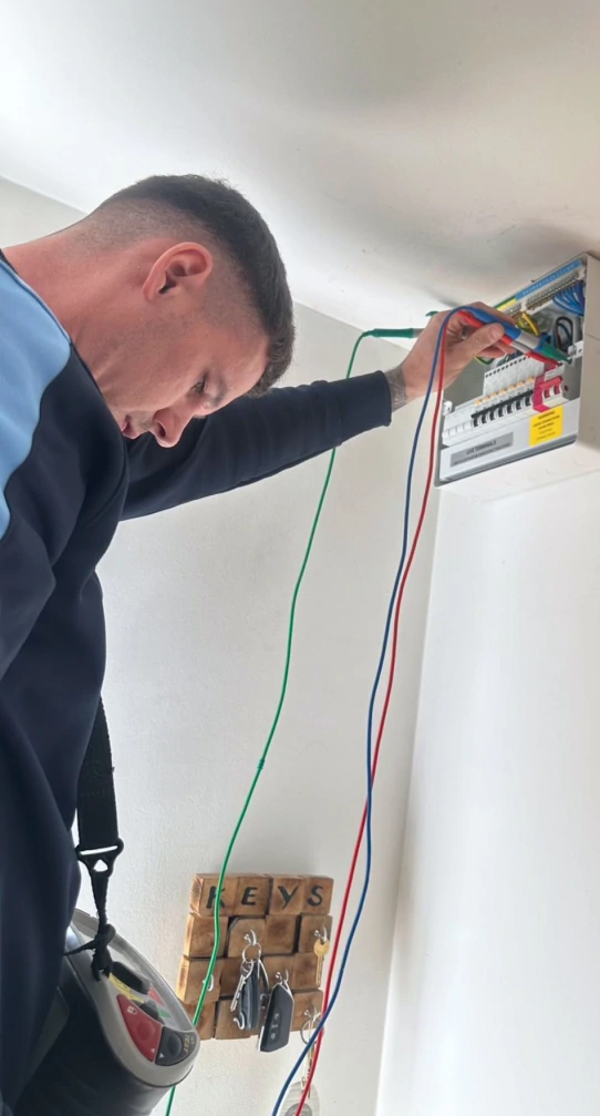 Lightwork Electrical electrician working on-site in Ross-on-Wye