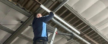 Commercial electrician working on site