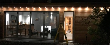 Outdoor lighting installation in a garden