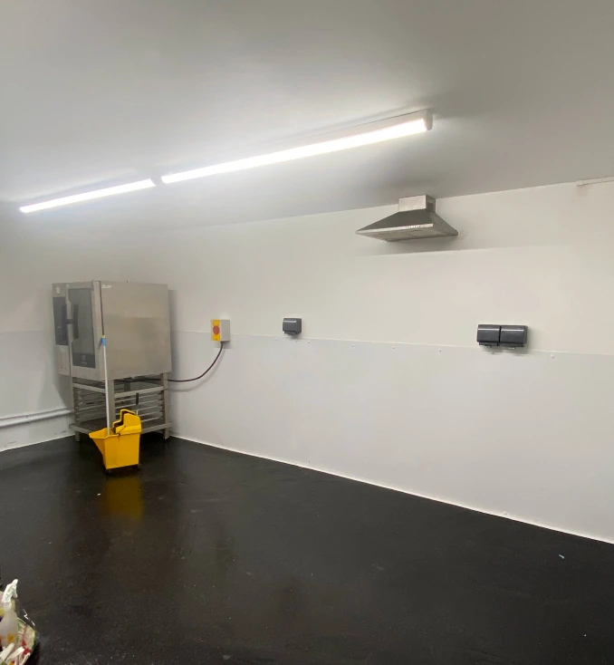 A commercial electrician at work