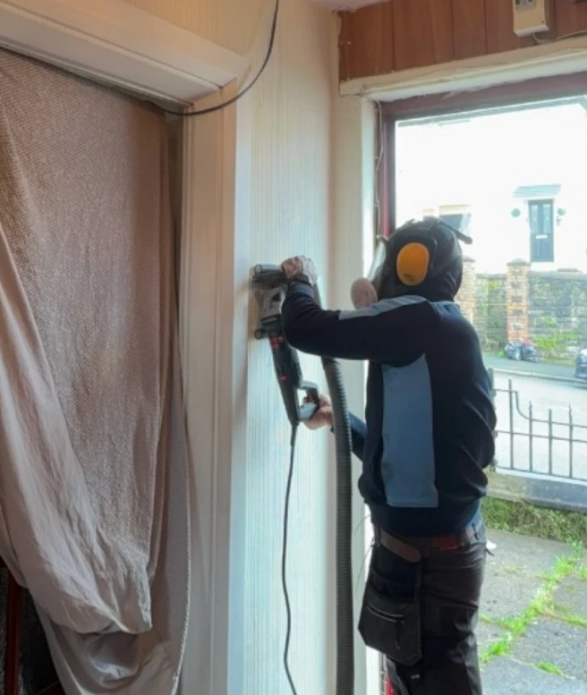 Electrician carrying out a full or partial rewire
