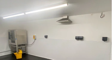 A commercial electrician at work