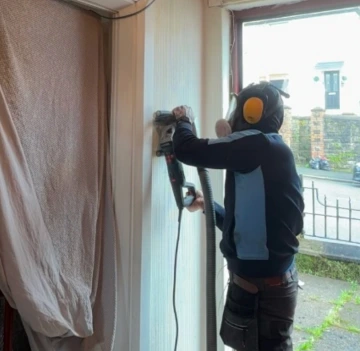 Electrician carrying out a full or partial rewire
