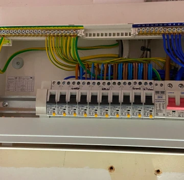 Fuse board replacement being carried out