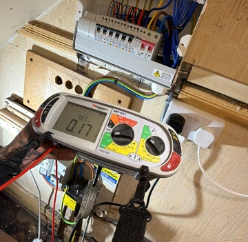 Electrical inspection and testing being carried out
