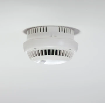 Smoke alarm electrician at work in South Wales