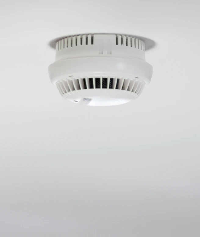 Smoke alarm installation in progress
